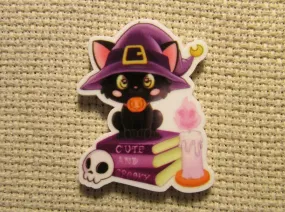 Black Cat Sitting on Spell Books Needle Minder, Cover Minder, Magnet