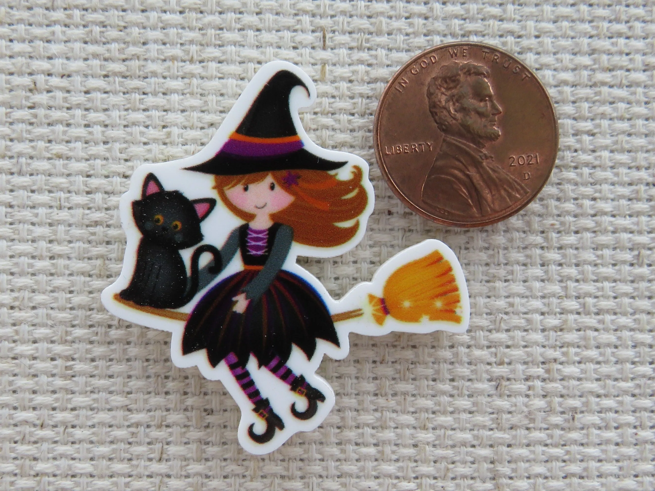 Cute Young Witch Riding on a Broom with a Black Cat Needle Minder, Cover Minder, Magnet